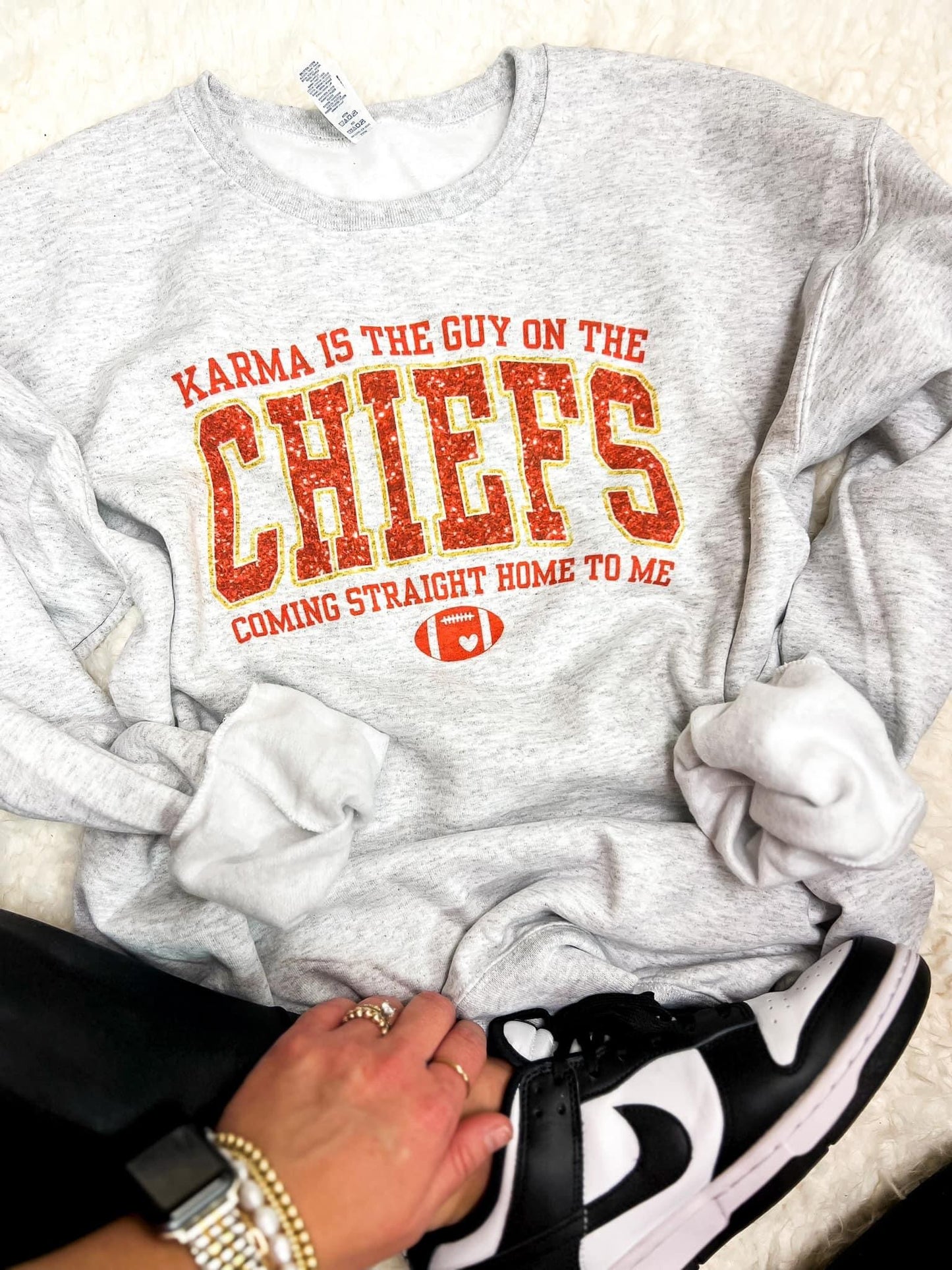 Karma Is the Guy on the Chiefs Sweatshirt