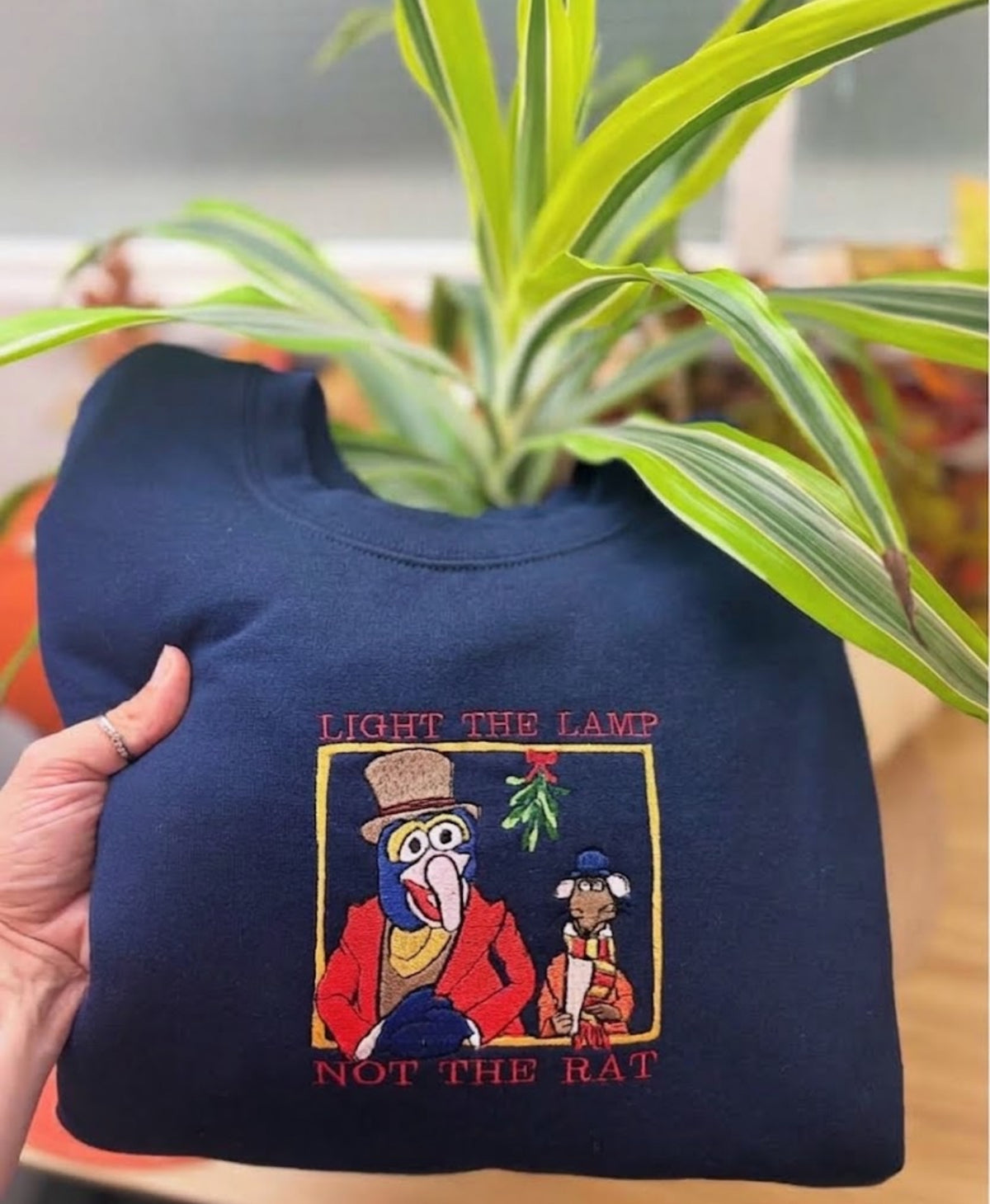 Light the Lamp Not the Rat Embroidered Crewneck