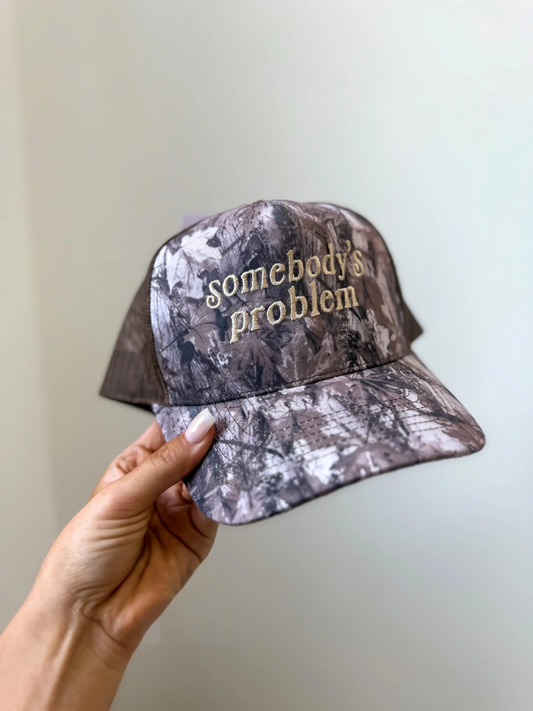 Somebody’s Problem Camo Embroidered Hat