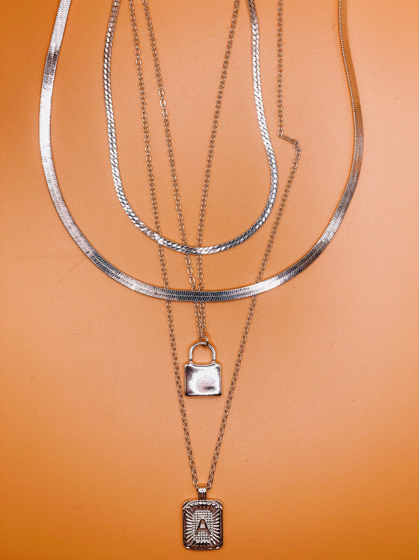 Silver Initial Letter and Lock Multi Layer Necklace in Silver Setting